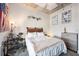 Comfortable bedroom offers a cozy bed with a drum set, American flag, and tasteful decorations at 150 Bee St # 714, Charleston, SC 29401