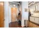 Modern entryway with a stylish door, coat rack, adjacent to a well-equipped kitchen, making a lasting impression at 150 Bee St # 714, Charleston, SC 29401