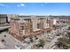 Stunning building exterior featuring red brick, multiple balconies, and landscaped surroundings at 150 Bee St # 714, Charleston, SC 29401