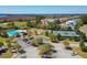 Aerial shot of community amenities with a pool, playground, tennis court, and lush landscaping at 1717 Rivertowne Country Club Dr, Mount Pleasant, SC 29466