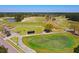 Expansive golf course with manicured greens, sand traps, and mature trees on a sunny day at 1717 Rivertowne Country Club Dr, Mount Pleasant, SC 29466