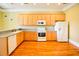 Kitchen featuring stainless steel appliances and light wood cabinetry at 1717 Rivertowne Country Club Dr, Mount Pleasant, SC 29466