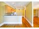 Kitchen featuring granite countertops, stainless steel appliances, and wood flooring at 1717 Rivertowne Country Club Dr, Mount Pleasant, SC 29466
