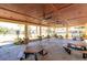 Covered pavilion with picnic tables, ceiling fans, and views of the playground, ideal for community gatherings at 1717 Rivertowne Country Club Dr, Mount Pleasant, SC 29466