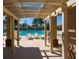 Inviting community pool with lounge chairs offering a relaxing spot for residents at 1717 Rivertowne Country Club Dr, Mount Pleasant, SC 29466