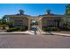 Pool entrance with pergola and palm trees, welcoming residents to a refreshing swim at 1717 Rivertowne Country Club Dr, Mount Pleasant, SC 29466