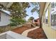 Outdoor patio deck complete with palm tree, table and chairs at 221 Church St, Mount Pleasant, SC 29464
