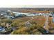 Aerial view of waterfront property with private dock and homes at 232 Haddrell St, Mount Pleasant, SC 29464