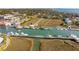 A landscape aerial view shows the nearby waterway at 232 Haddrell St, Mount Pleasant, SC 29464