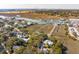 Picturesque aerial view of the charming coastal community with a bridge in the distance at 232 Haddrell St, Mount Pleasant, SC 29464