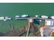 Aerial view of a small house with private dock surrounded by water at 232 Haddrell St, Mount Pleasant, SC 29464