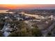 Breathtaking aerial shot of a coastal community, harbor, and Ravenel Bridge at sunset at 232 Haddrell St, Mount Pleasant, SC 29464