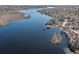 A captivating aerial view of a calm lake, highlighting waterfront properties and lush landscapes at 24 N Basilica Ave, Hanahan, SC 29410