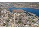 Aerial view of a neighborhood with water access, showcasing the surrounding trees and community at 24 N Basilica Ave, Hanahan, SC 29410