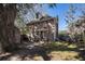 Brick home with a partially shaded backyard, offering a serene and private outdoor space at 24 N Basilica Ave, Hanahan, SC 29410