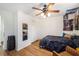 Bedroom boasts hardwood floors, ceiling fan, and closet, creating a comfortable and inviting space at 24 N Basilica Ave, Hanahan, SC 29410