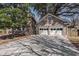 A two-car attached garage is highlighted in this shot of the home's exterior at 24 N Basilica Ave, Hanahan, SC 29410