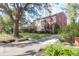Traditional brick two story home with symmetrical windows and beautiful curb appeal at 26 Beverly Rd, Charleston, SC 29407