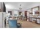 Bright living room featuring a fireplace, elegant decor, and a comfortable seating area at 26 Beverly Rd, Charleston, SC 29407