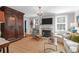 Comfortable living room featuring a fireplace, beautiful hardwood floors, and stylish furnishings at 26 Beverly Rd, Charleston, SC 29407