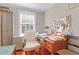 This bright and airy office features hardwood floors, a window, and plenty of storage space at 26 Beverly Rd, Charleston, SC 29407