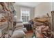 Organized storage space featuring shelving, a window, and various storage containers at 26 Beverly Rd, Charleston, SC 29407