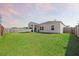 Spacious backyard with green grass, perfect for outdoor activities and relaxation at 269 Firewheel Ct, Summerville, SC 29486