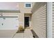 Exterior view of home with a two car garage, nice landscaping and well kept lawn at 269 Firewheel Ct, Summerville, SC 29486