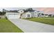 Charming single-Gathering home featuring a well-manicured lawn and an attached two-car garage at 269 Firewheel Ct, Summerville, SC 29486