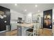 Modern kitchen featuring granite countertops, stainless steel appliances, and a kitchen island with seating at 269 Firewheel Ct, Summerville, SC 29486