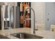 Modern kitchen features stainless steel appliances, granite countertops and a gooseneck faucet at 269 Firewheel Ct, Summerville, SC 29486