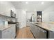 Bright kitchen with stainless steel appliances, granite countertops, and light gray cabinetry at 269 Firewheel Ct, Summerville, SC 29486