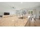 Granite kitchen island and sink in view of the living area at 269 Firewheel Ct, Summerville, SC 29486