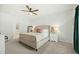 Bright main bedroom with neutral decor, ceiling fan and ensuite bathroom at 269 Firewheel Ct, Summerville, SC 29486