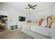 Spacious main bedroom with plush carpeting, ceiling fan, and ample natural light at 269 Firewheel Ct, Summerville, SC 29486