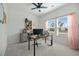 Well-lit home office with neutral colors, desk setup, and ample natural light from the window at 269 Firewheel Ct, Summerville, SC 29486
