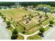 Community playground surrounded by green space and walking trails in a Gathering-friendly neighborhood at 269 Firewheel Ct, Summerville, SC 29486