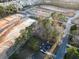 Aerial view of a residential area with new construction and wooded lots, showing neighborhood development at 2929 Salamander Creek Ln, North Charleston, SC 29406