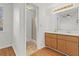 The bathroom features a double vanity with wood cabinets and a walk-in shower at 2929 Salamander Creek Ln, North Charleston, SC 29406