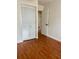 Bedroom featuring hardwood floors, a closet, and white paint at 2929 Salamander Creek Ln, North Charleston, SC 29406