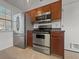 Well-equipped kitchen featuring stainless steel appliances and ample cabinet space at 2929 Salamander Creek Ln, North Charleston, SC 29406