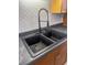 Close up of a modern kitchen sink with a stylish faucet and backsplash at 2929 Salamander Creek Ln, North Charleston, SC 29406