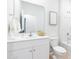 Bright bathroom with a white vanity, a large mirror, and a shower-tub combo at 310 Pine Crest View Dr, Summerville, SC 29486