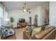 Stylish living area with hardwood floors, comfortable seating, and a view of the media console at 317 Catawba Branch Way, Moncks Corner, SC 29461