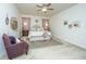 Serene main bedroom features plush carpets, ample lighting, and decorative accents at 317 Catawba Branch Way, Moncks Corner, SC 29461