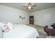 Comfortable main bedroom offers plush carpeting, dresser, and a restful atmosphere at 317 Catawba Branch Way, Moncks Corner, SC 29461