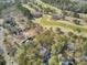 An aerial shot of a residential area adjacent to a scenic golf course at 3334 Cottonfield Dr, Mount Pleasant, SC 29466