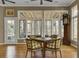Charming dining area with hardwood floors, natural light, and a vintage clock at 3334 Cottonfield Dr, Mount Pleasant, SC 29466