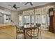Cozy dining area features a stylish light fixture and large windows at 3334 Cottonfield Dr, Mount Pleasant, SC 29466