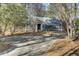 Charming home with a well-manicured lawn and long driveway at 3334 Cottonfield Dr, Mount Pleasant, SC 29466